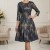 Rochie de ocazie Gisele din jerse cu imprimeu metalizat turquoise-aramiu, maneci 3/4, croiala lejera