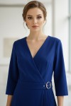 Rochie Cosmina din stofa albastra cu pieptii petrecuti si fusta plisata