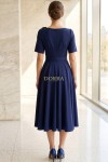 Rochie midi Leah din stofa bleumarin, masuri mari, cu floare detasabila si curea