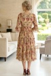 Rochie midi Raluca din voal bej cu imprimeu floral și volane