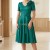 Rochie de ocazie Sabinna din stofa verde cu sclipici, floare detasabila si cordon