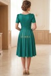 Rochie de ocazie Sabinna din stofa verde cu sclipici, floare detasabila si cordon