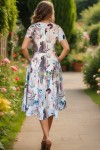 Rochie midi Rylie crem cu imprimeu pastel, croiala clos si buzunare